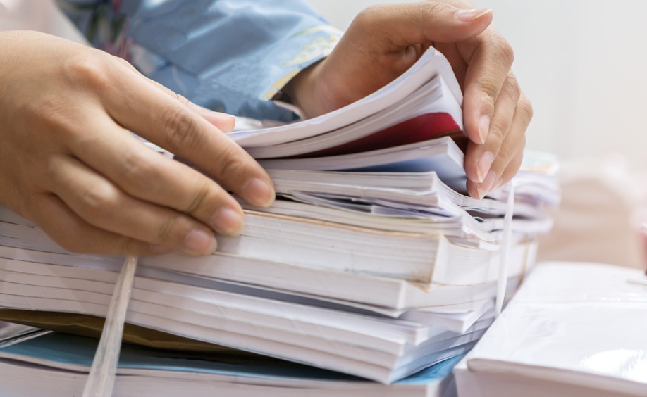 Sifting through stack of documents