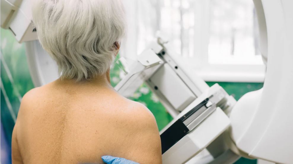 Woman getting mammogram