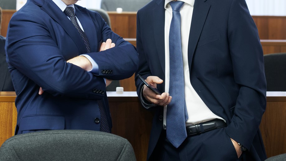 Men in business suits talking