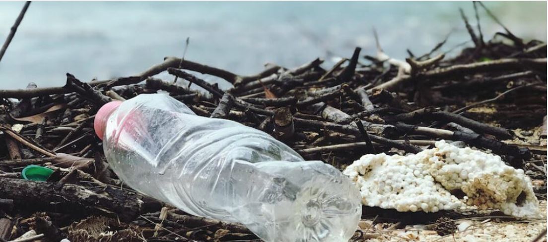 Plastic water bottle on beach