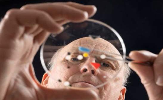 Researcher looking at microplastics