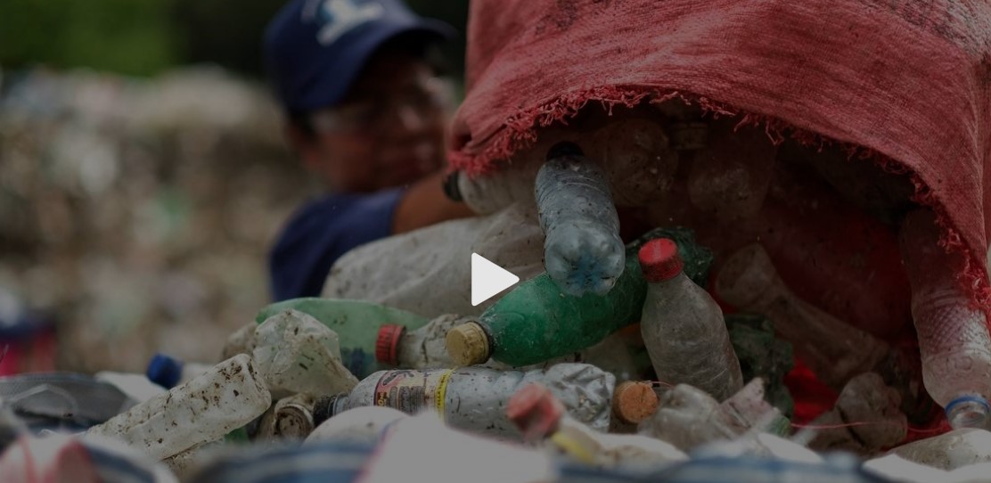 Person sorting plastic trash
