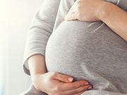 Hands on pregnant belly