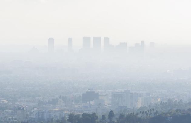 City skyline obscured by smog