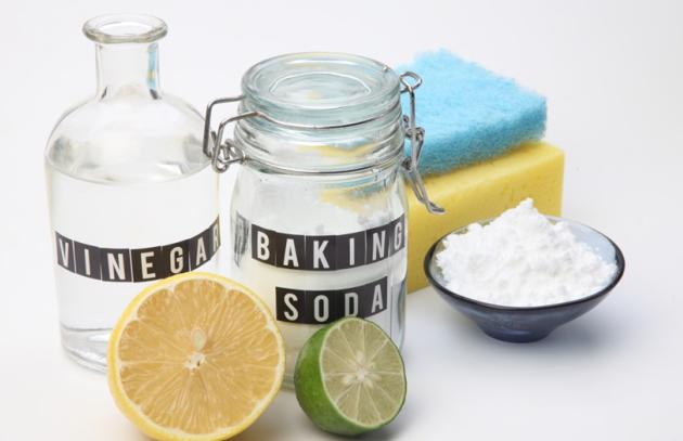 Jars of vinegar and baking soda for cleaning
