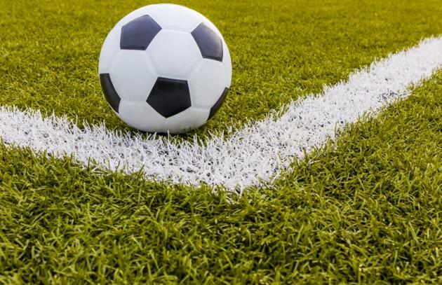 Soccer ball on synthetic turf