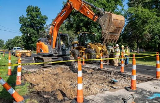 Excavator in construction zone