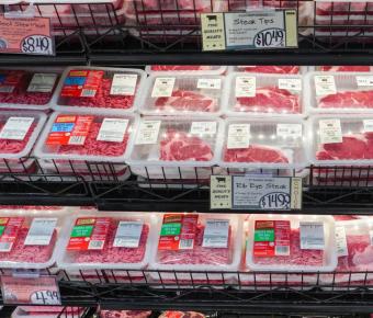Plastic wrapped meat in grocery store