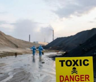 Toxic Danger sign in front of factory