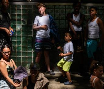 Kids gathered together in a room